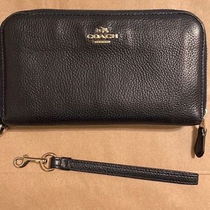 Genuine Coach clutch *no longer making this style *Navy color